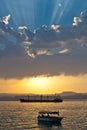 Tanker and Boat in the Sunset