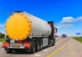 Tanker with chrome tanker on the highway.