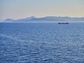 A Tanker crossing the Aegean sea with Greek coasts in background.