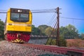 Tanker-freight train by diesel locomotive passed the railway curve.