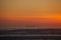 Tanker at sea with sunset