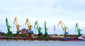 Tanker ship and working crane in Klaipeda port, Lithuania.