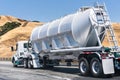 Tanker truck driving on the freeway through the hills of Alameda County, East San Francisco Bay Area, California Royalty Free Stock Photo