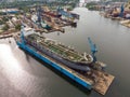 Tanker vessel repair in dry dock Shipyard, aerial view Royalty Free Stock Photo