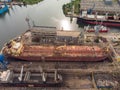 Tanker vessel repair in dry dock Shipyard, aerial view Royalty Free Stock Photo