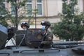 Tankman soldier on a gun turret of a Russian army military armored vehicle tank at Sadovaya street garden Ring