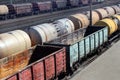 Tanks with fuel and cargo carriages on freight railway station