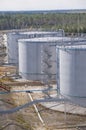 Tanks with oil for further transportation of oil through pipes at an oil refinery and oil pumping station