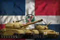 Dominican Republic tank forces concept. tanks with orange camouflage on flag background. 3d Illustration Royalty Free Stock Photo