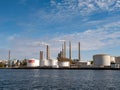 Tanks and stacks of Circle K oil and gas terminal along Limfjord in Aalborg, Nordjylland, Denmark