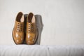 Tanned Brogue Derby Shoes Made of Calf Leather with Rubber Sole Standing Together Royalty Free Stock Photo