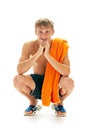 Tanned man with towel Royalty Free Stock Photo