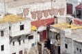 Tanner drying hides on the roof top of the Tannery in Fes