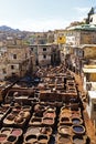 Tanners working leather in the old tannery of Fes, Morocco Royalty Free Stock Photo