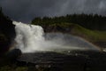 Tannforsen waterfall with a rainbow