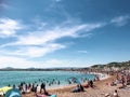 Tanning people under the umbrella enjoy their relax summer break holiday at the clear blue ocean