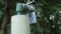 Unsafe Tap Beneath Green Surroundings Royalty Free Stock Photo