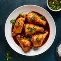 Tantalizing chicken tikka on a pristine white plate