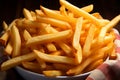 A tantalizing close up of golden, crispy French fries