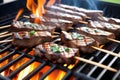 Delicious Grilled Beef Satay Skewers with Flavorful Seasonings and Flames Royalty Free Stock Photo