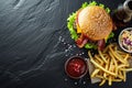 Gourmet Burger Meal on Dark Slate Surface - Casual Dining