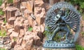 Tantric Deities statue in Ritual Embrace located in a mountain g