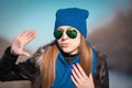 Tanya. Woman face blue hat, sunglasses