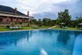 Large resort swimming infinity pool at the Ngorongoro Coffee Lodge near the Ngorongoro Crater Royalty Free Stock Photo