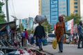TANZANIA, ARUSHA - 15 Jan 2020: Carry good on the head is african skill. People on the street in Arusha city, Tanzania