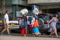 TANZANIA, ARUSHA - 15 Jan 2020: Carry good on the head is african skill. People on the street in Arusha city, Tanzania