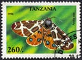TANZANIA - CIRCA 1996: A stamp printed in Tanzania shows image of an Io Moth Automeris io , circa 1996 Royalty Free Stock Photo