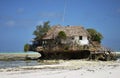 Tanzania, Zanzibar - February 2018. Unusual restaurant on the rock. Royalty Free Stock Photo