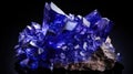 tanzanite (violet zoisite) crystal on black background. macro detail texture background. close-up raw rough