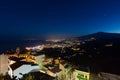 Taormina Bay and the Etna Volcano at dusk seen from Castelmola Royalty Free Stock Photo