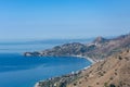 Taormina Bay in a summer day seen from Forza D`AgrÃÂ², Sicily Royalty Free Stock Photo