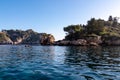 Taormina - Coastal rock formations at Ionian Mediterranean sea in Taormina, Sicily, Italy, Europe, EU