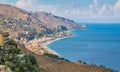 Panoramic sight of the sicilian coastline as seen from Taormina. Province of Messina, Sicily, southern Italy. Royalty Free Stock Photo