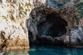 Taormina - Entrance of sea cave Blue Grotto (Grotta Azzurra) near Isola Bella in Taormina, Sicily, Italy, Europe, EU.