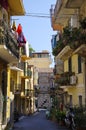 Mopeds parked in one of the side-street of famous Taormina town in August peak season of 2017er