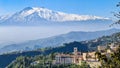 Taormina - Luxury San Domenico Palace Hotel with panoramic view on snow capped Mount Etna volcano in Taormina, Sicily Royalty Free Stock Photo