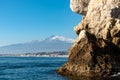 Taormina - Panoramic view from open sea on snow capped volcano Mount Etna in Taormina, Sicily, Italy, Europe, EU.