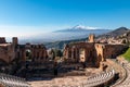 Taormina - Panoramic view of snow capped Mount Etna volcano seen from the ancient Greek theatre of Taormina, island Sicily, Italy Royalty Free Stock Photo