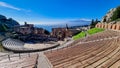Taormina - Panoramic view of snow capped Mount Etna volcano seen from the ancient Greek theatre of Taormina, island Sicily, Italy Royalty Free Stock Photo