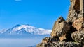 Taormina - Panoramic view of snow capped Mount Etna volcano seen from the ancient Greek theatre of Taormina, island Sicily, Italy Royalty Free Stock Photo