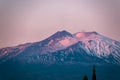 Taormina - Panoramic view of snow capped Mount Etna volcano during sunrise from Taormina, Sicily, Italy, Europe, EU Royalty Free Stock Photo