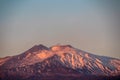 Taormina - Panoramic view of snow capped Mount Etna volcano during sunrise from Taormina, Sicily, Italy, Europe, EU Royalty Free Stock Photo