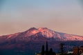 Taormina - Panoramic view of snow capped Mount Etna volcano during sunrise from Taormina, Sicily, Italy, Europe, EU Royalty Free Stock Photo