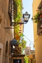 Taormina, Sicily, Italy - 28 September 2023. A side entrance of Dior in Vico Ascanio Marziani on the corner of Corso Umberto Royalty Free Stock Photo