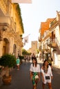 Taormina, Sicily, Italy - 28 September 2023. Tourists in the famous main street Corso umberto in Taormina. City views, facades,