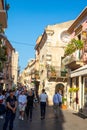 Taormina, Sicily, Italy - 28 September 2023. Tourists in the famous main street Corso umberto in Taormina. City views, facades,